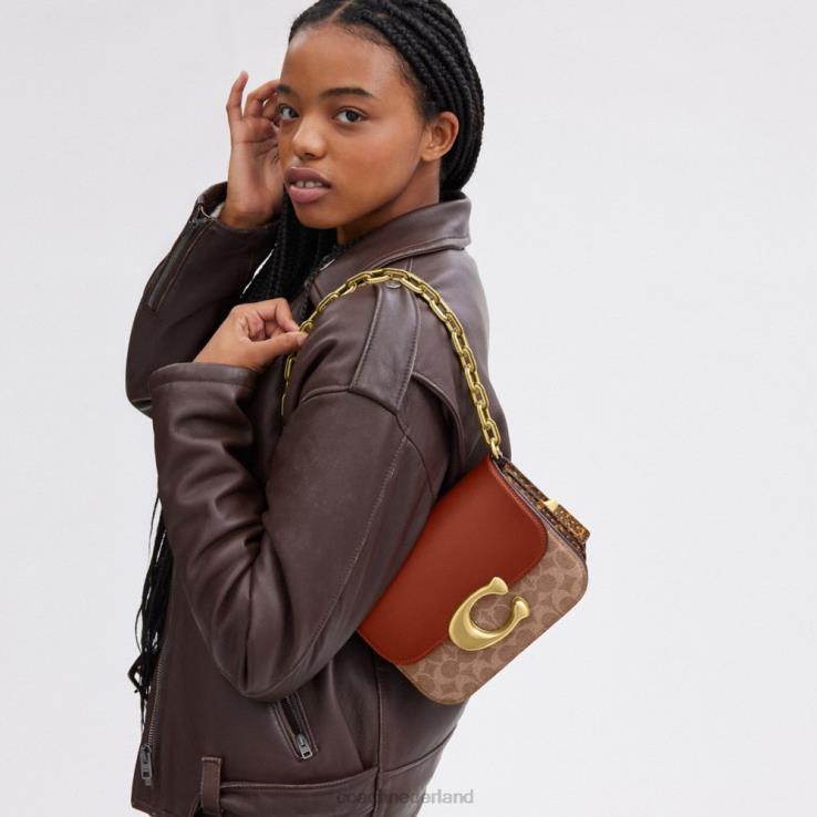 Coach vrouwen idoltas van kenmerkend canvas met slangenleerdetail b4/bruin roest 0226446