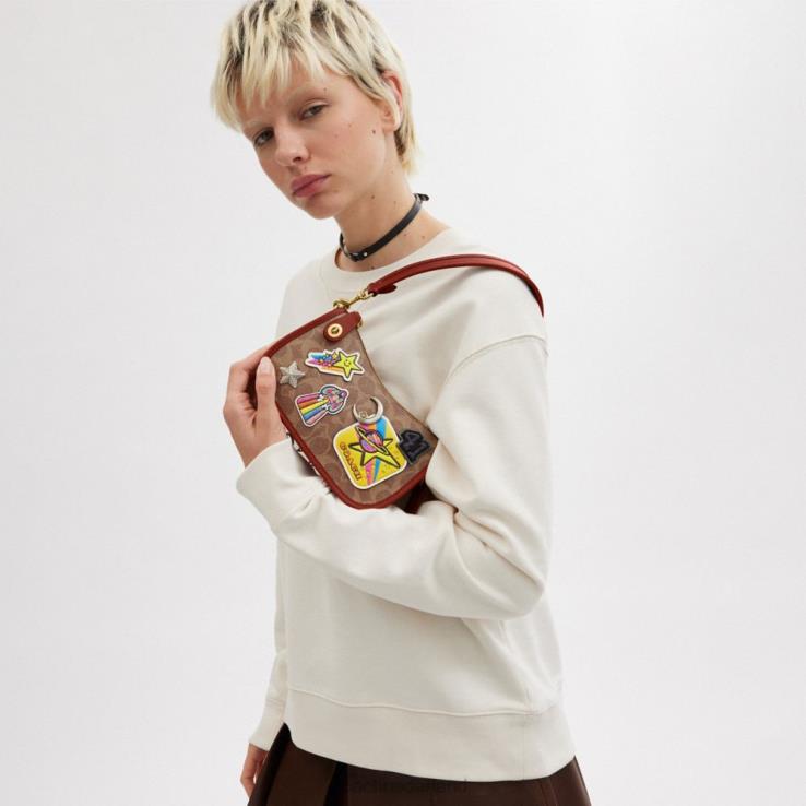 Coach vrouwen kosmische coach swinger 20 in kenmerkend canvas met patches b4/tan roest multi 02264186
